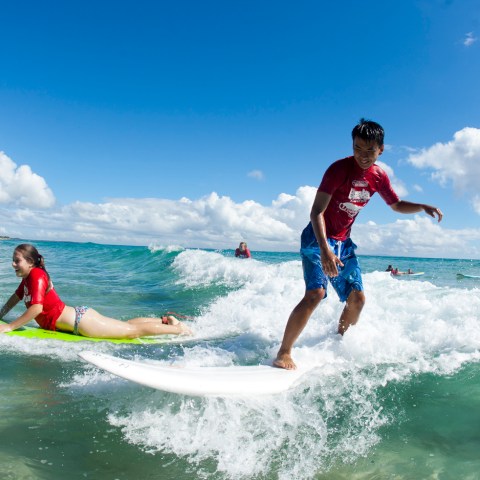 A surfer perfectly riding a rave